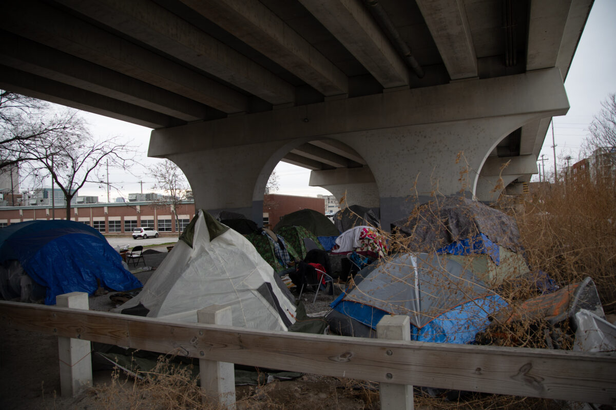 homeless camp under a bridge overpass